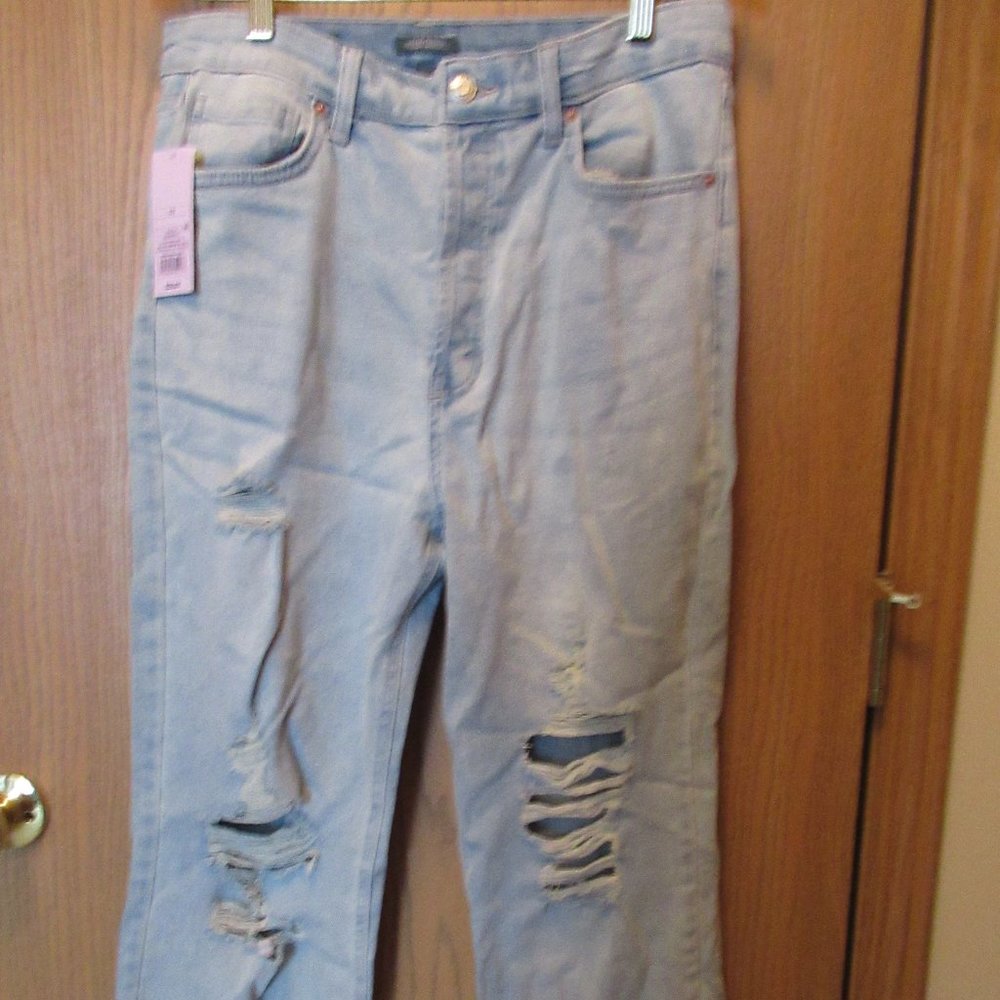 Distressed light blue jeans size 12